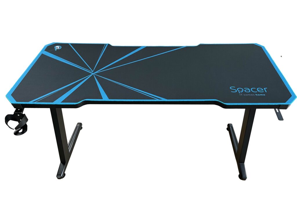 Birou gaming Spacer, 140 x 60 cm, blat MDF invelit in textura de fibra de carbon, picioare reglabile, RGB, telecomanda wireless, mousepad pe toata suprafata